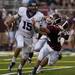 Pioneer senior quarterback Aedan York outruns Dexter defenders Friday. Pioneer defeated Dexter 69-0.  Daniel Brenner I AnnArbor.com